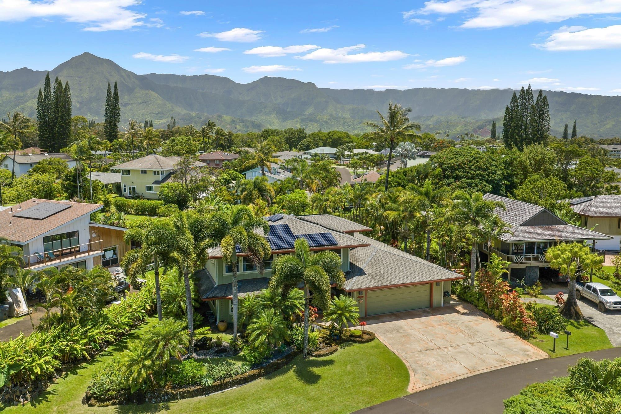 Princeville from above, green mountains behind