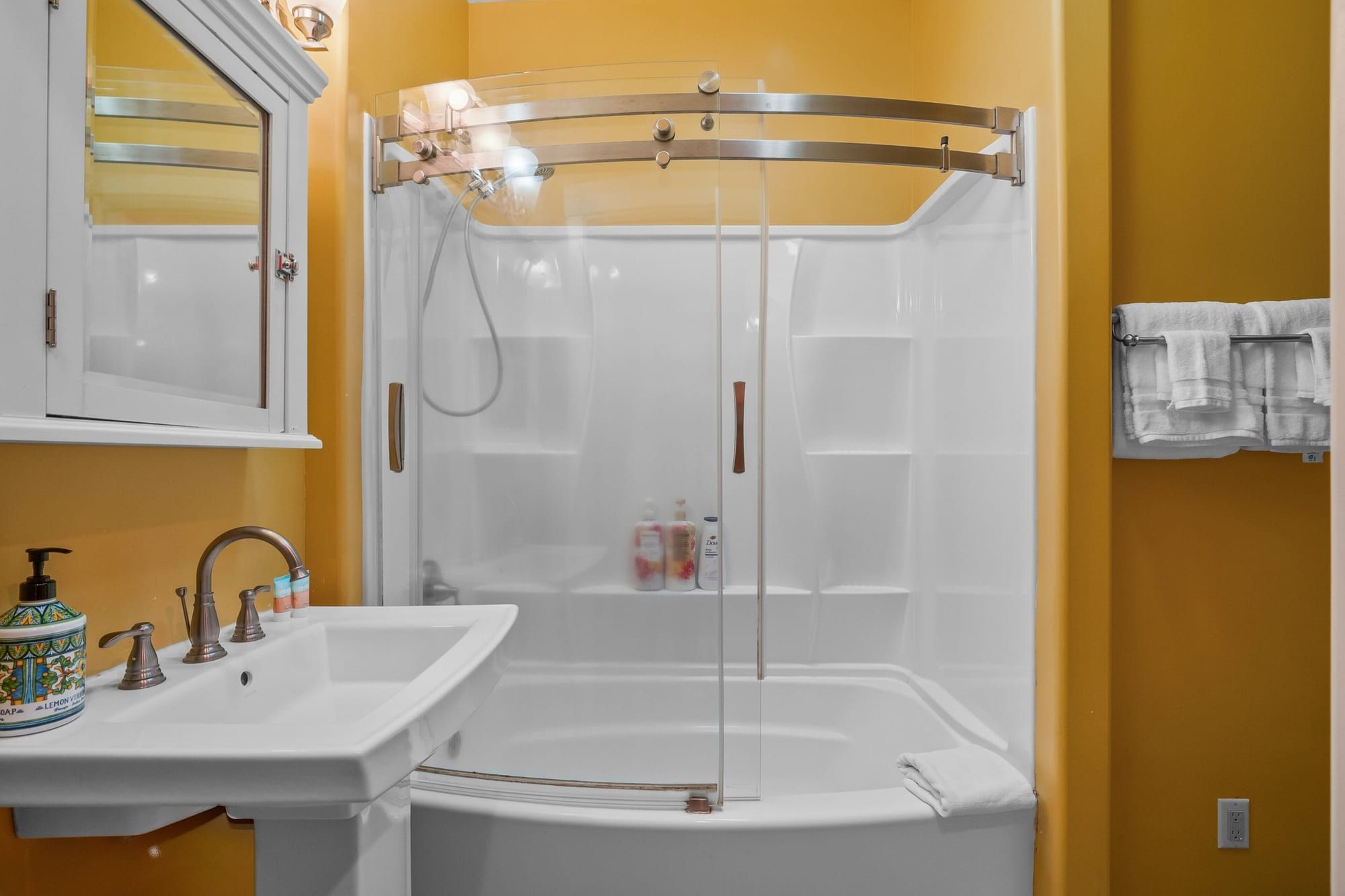Bath with a glass shower