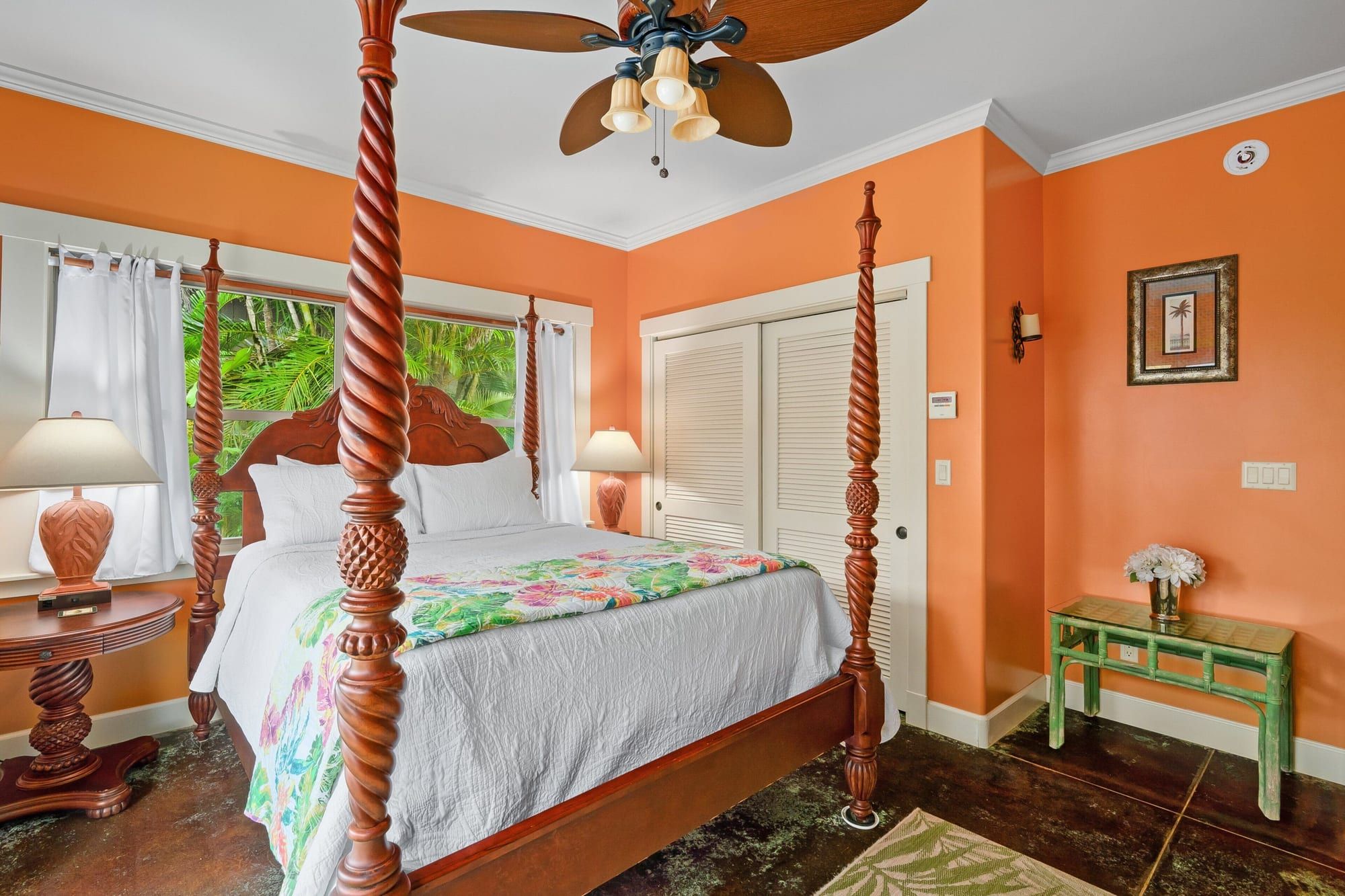 Four-poster bed in a coral room