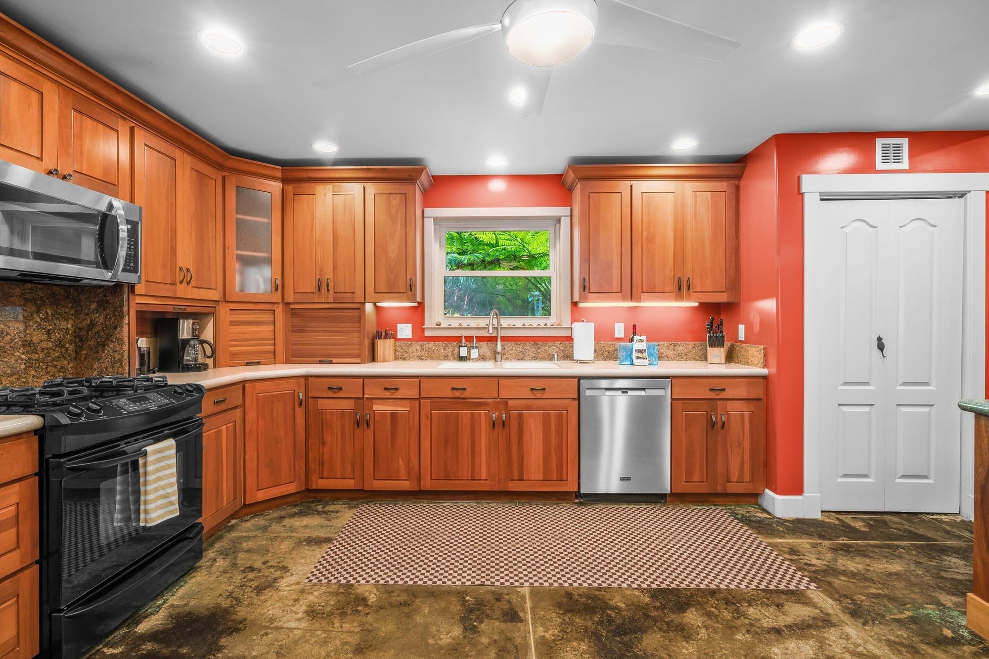 The kitchen with a gas range and dishwasher